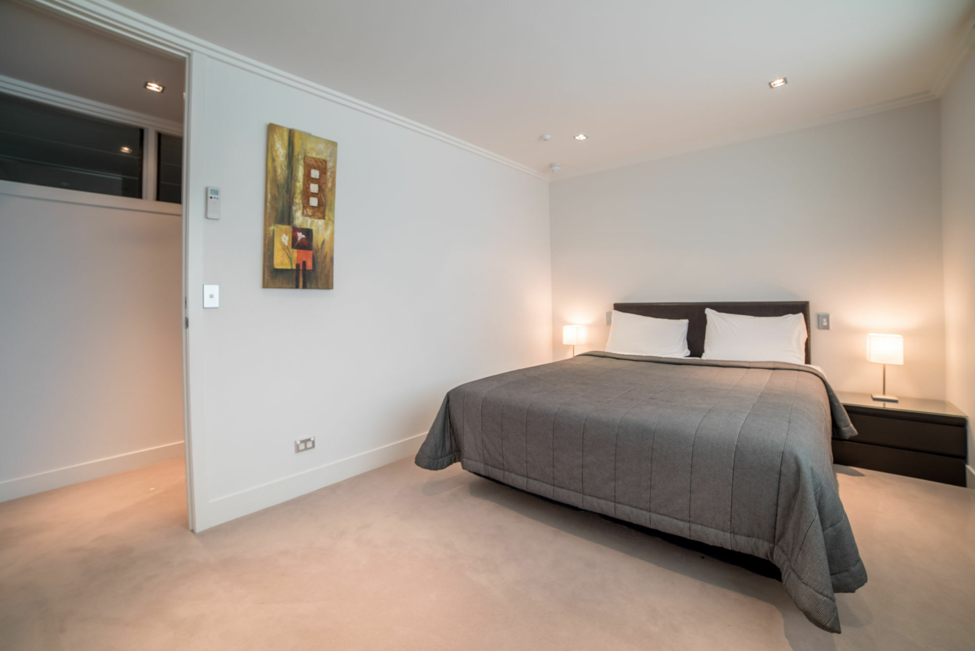 圣水陶波酒店 外观 照片 A bedroom in a serviced apartment